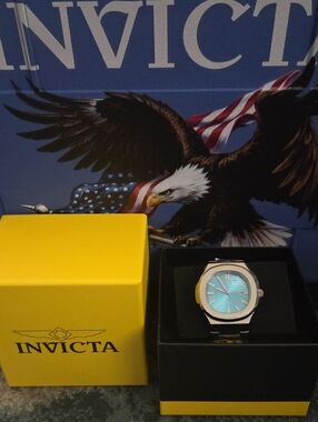 Invicta Speedway Quartz 3 Model 48322. Silver Watch with Turquoise Dial